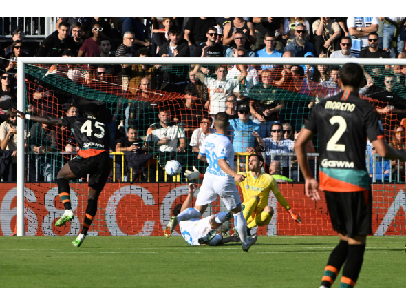 Venezia FC's Nigerian forward #45 Akor Adams (L) scores a goal during the Italian Serie A football match between Venezia and Napoli at the Pier Luigi Penzo Stadium, in Venice northeastern Italy, on October 17, 2027. (Photo by ANDREA PATTARO / AFP)