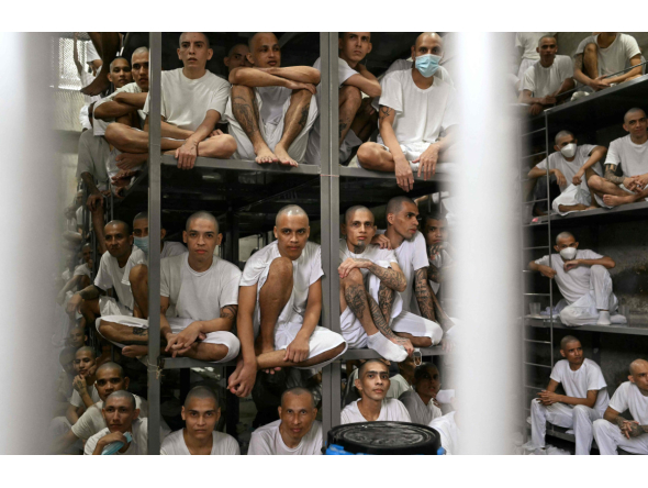Inmates are pictured during a visit of Costa Rica's President Laura Fernandez at the CECOT prison in Tecoluca, El Salvador on October 16, 2026. (Photo by Marvin RECINOS / AFP)