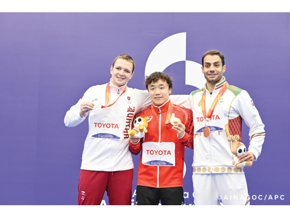 Qatar's Shamil Shahov (left) with gold winner Genki Saito of Japan and bronze medallist Abadi Karimi Jahan of Iran during the men’s 100m breaststroke (SB12) podium ceremony.