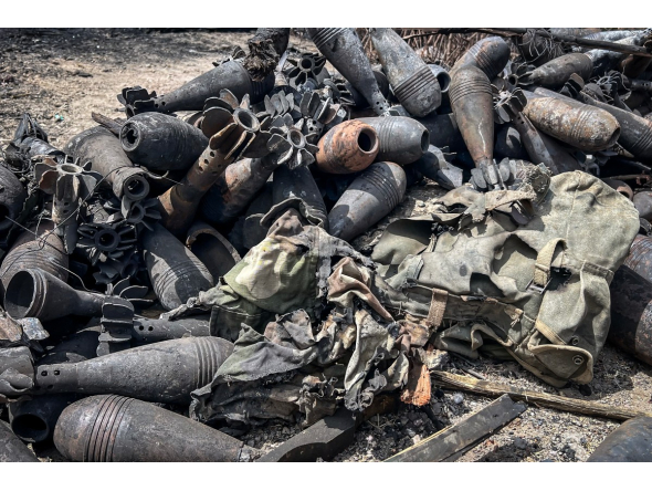 Mortar shells and other ammunition remnants lie scattered along a road following clashes between Ethiopian federal forces and armed groups opposed to the government in Adigrat on October 17, 2026. AFP.
