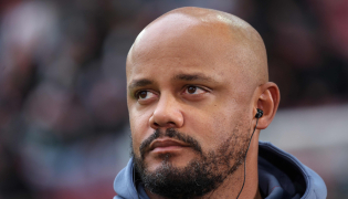 (FILES) Bayern Munich's Belgian head coach Vincent Kompany is interviewed prior to the German first division Bundesliga football match between FC Augsburg and FC Bayern Munich in Augsburg, southern Germany on October 10, 2026. (Photo by Karl-Josef HILDENBRAND / AFP)