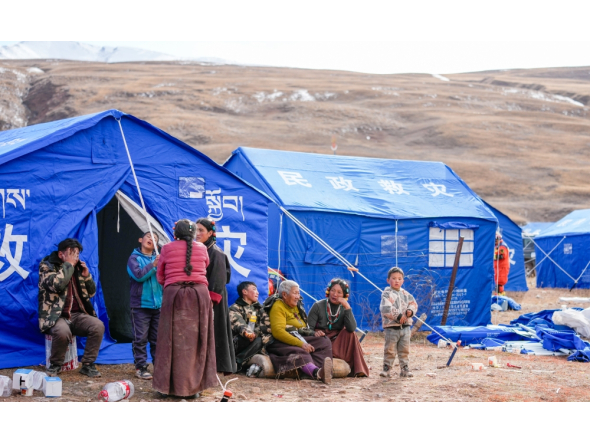 People are seen at a temporary resettlement site of an earthquake-hit village in Maru Township of Baqen County, Nagqu City, southwest China's Xizang Autonomous Region, (Xinhua/Tenzin Nyida)
 