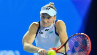 Kazakhstan's Elena Rybakina hits a return to Russia's Diana Shnaider during their women's singles semifinal match at the Ningbo Open tennis tournament in Ningbo, China's eastern Zhejiang province on October 24, 2026. (Photo by CN-STR / AFP) 
