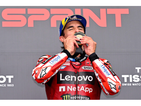 Marc Marquez celebrates after winning the MotoGP sprint. 