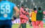Pakistan's Shadab Khan (2L) and Haris Rauf (L) celebrate after their team's victory in the one-day international (ODI) tri-series cricket match against England at the Gaddafi Stadium in Lahore on October 25, 2026. (Photo by ARIF ALI / AFP)