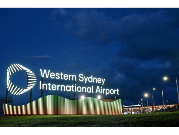 A view of signage at the newly-opened Western Sydney International Airport in Sydney on October 26, 2026. (Photo by Saeed Khan / AFP)
