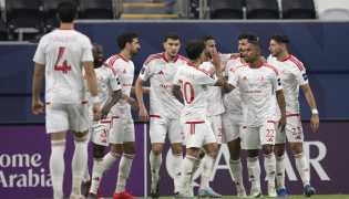 Al Shamal players celebrate a goal againstAl Hilal.
