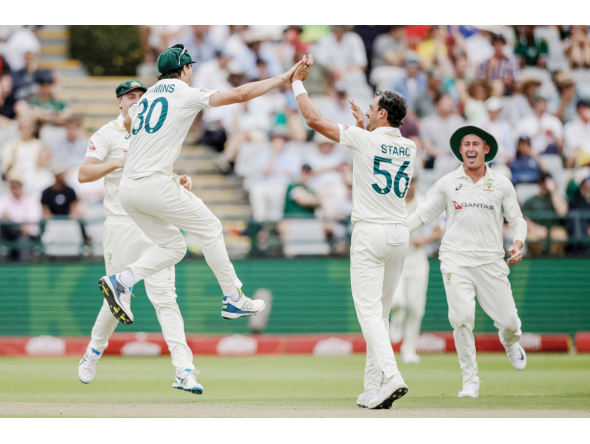 Australia’s Mitchell Starc (second right) celebrates the dismissal of South Africa’s Wiaan Mulder with teammates.