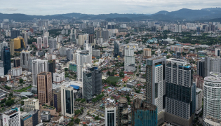 Commercial buildings are seen in Kuala Lumpur on October 26, 2026. Photo by MOHD RASFAN / AFP