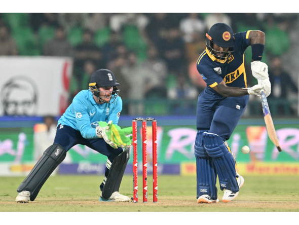 Sri Lanka's Avishka Fernando (R) plays a shot during the one-day international (ODI) tri-series cricket match between England and Sri Lanka at the Gaddafi stadium in Lahore on October 29, 2026. (Photo by ARIF ALI / AFP)