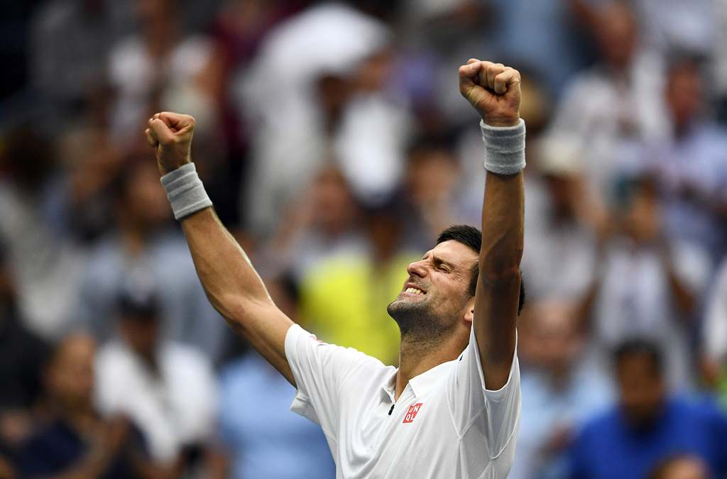 Novak Djokovic of Serbia celebrates after defeating Gael Monfils of France during their 2016 US Open Men's Singles semifinal match at the USTA Billie Jean King National Tennis Center in New York on September 9, 2016. (AFP / Jewel SAMAD)
