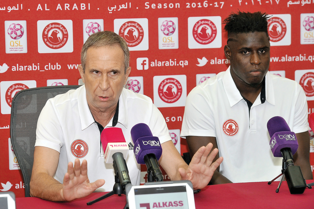Al Arabi coach Gerardo Pelusso (left) and player Mustafa Sal during a press conference at Al Sadd Stadium yesterday. RIGHT: El Jaish SC head coach Sabri Lamouchi (right) and player Mourad Naji during a press conference. Photos by Kammutty VP/The Peninsul