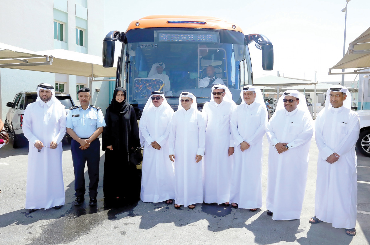 Minister of Transport and Communication H E Jassim bin Saif Al Sulaiti (fourth left), Minister of Education and Higher Education H E Dr. Mohammed Abdul Wahed Ali Al Hammadi (fifth left), Nasser bin Mohammed Al Malki (third right), Chairman, Board of Direc