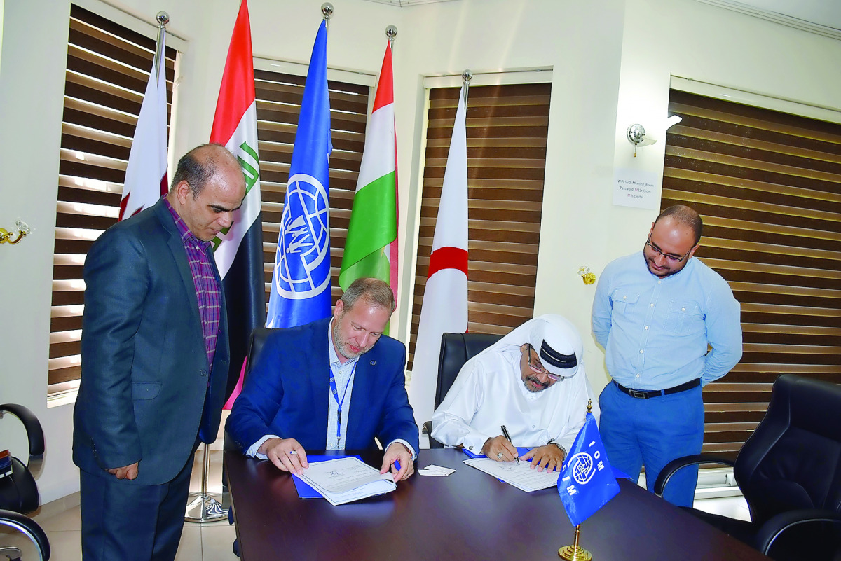 Officials signing the MoU.