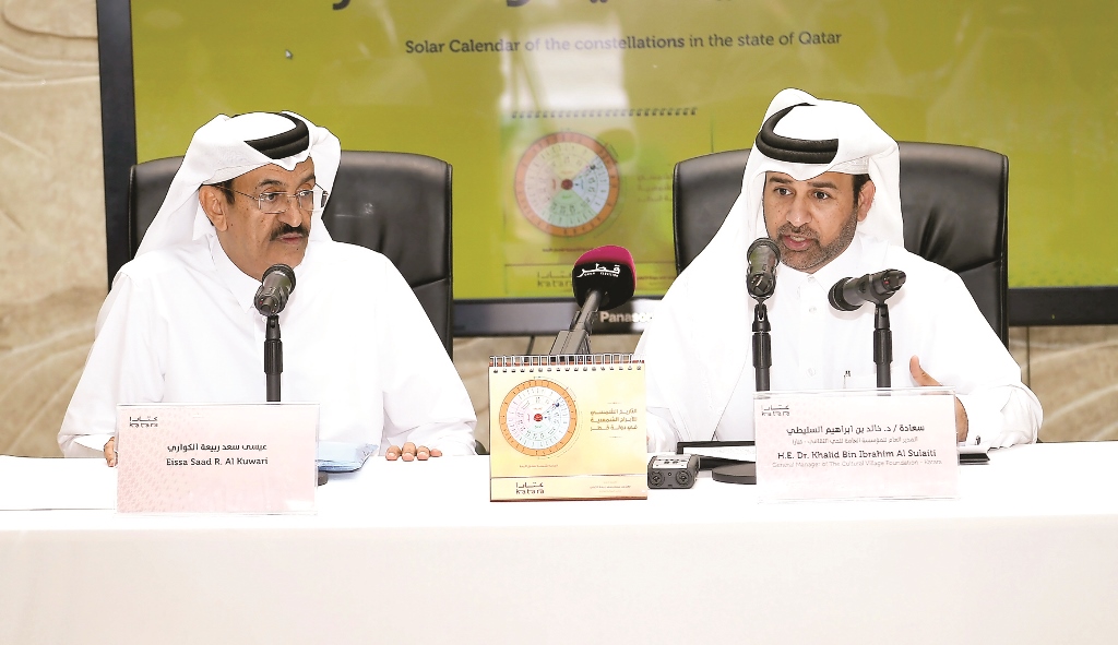 Katara General Manager Dr. Khalid bin Ibrahim Al Sulaiti (right) and Qatari Engineer Essa S R Al Kuwari at the launch of the calendar at Katara yesterday.