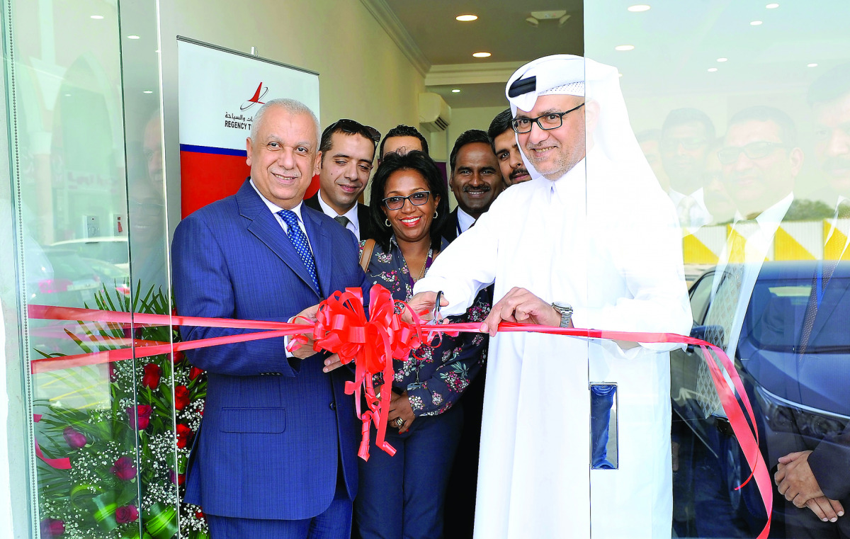 Regency Travel & Tours CEO Tareq Abdullatif Taha (right) and Ehab Abdel Fattah Amin, Senior Vice-President Commercial of Qatar Airways, inaugurating the branch yesterday in Umm Salal. (Pic: Kammutty VP/The Peninsula)