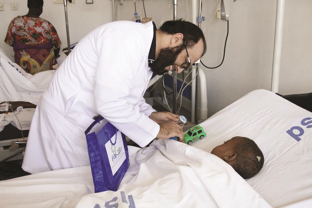 A child receiving treatment under a medical project launched by RAF in Sudan.