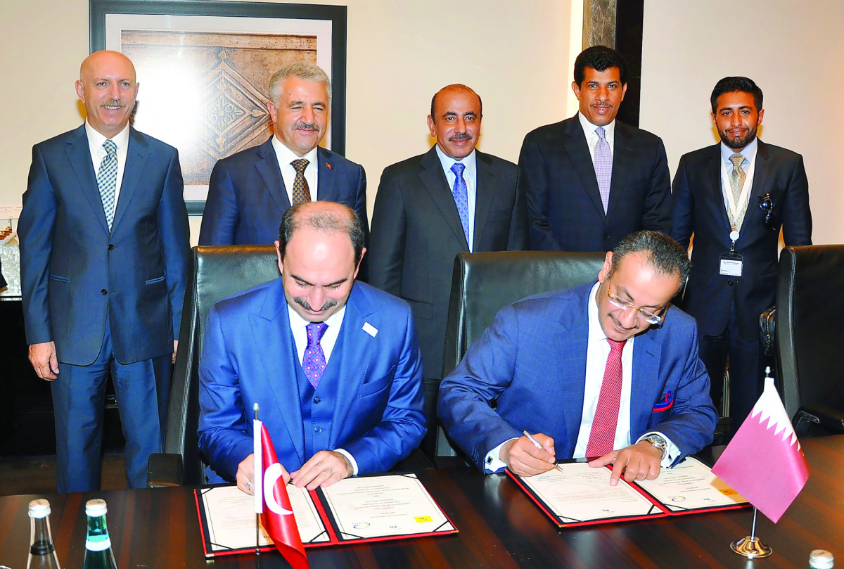 Qatar’s Minister of Transport and Communications H E Jassim bin Saif Al Sulaiti, Turkey’s Minister of Transport, Maritime and Communications Ahmet Arslan and Qatar’s Ambassador to Turkey Salem Mubarak Al-Shafi look on as Chairman of Qatar Postal Services 