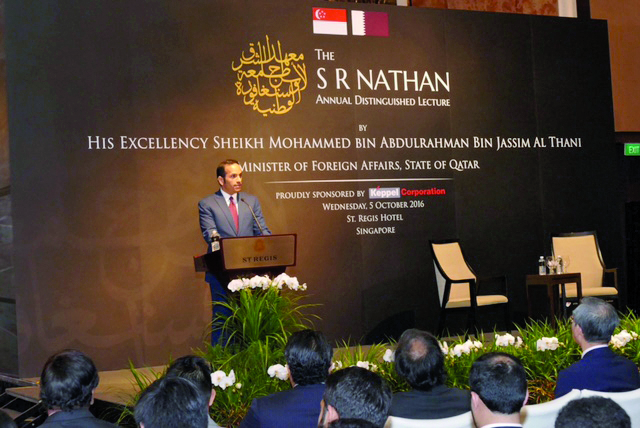 Foreign Minister H E Sheikh Mohamed bin Abdulrahman Al Thani giving a lecture at the Middle-East Institute in Singapore yesterday.
