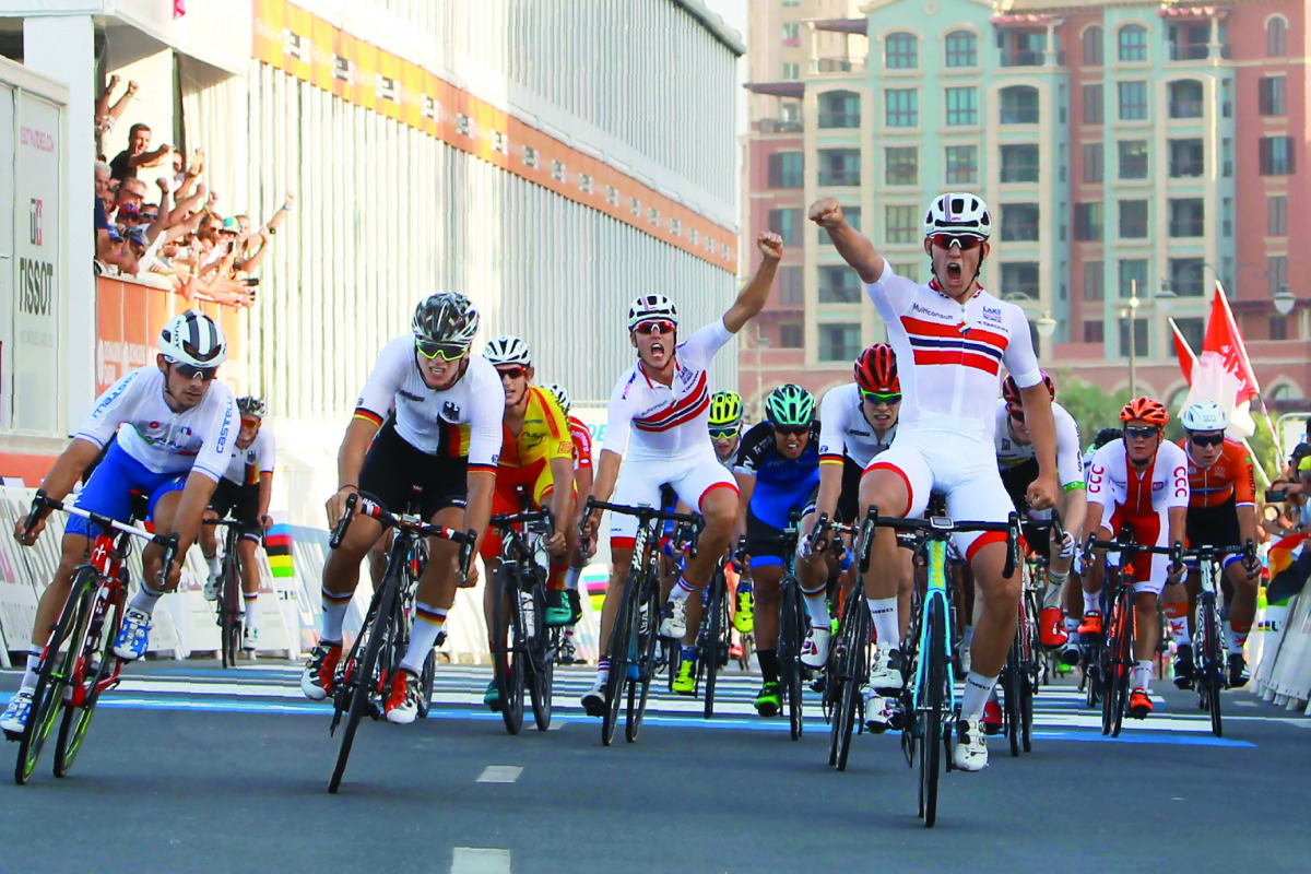 Norway’s Kristoffer Halvorsen (front right) celebrates after winning the men’s under-23 road race of the UCI Road World Championships 2016 in Doha