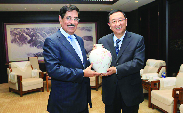 H E Dr Hamad bin Abdulaziz Al Kawari with China’s Minister of Culture Luo Shugang. 