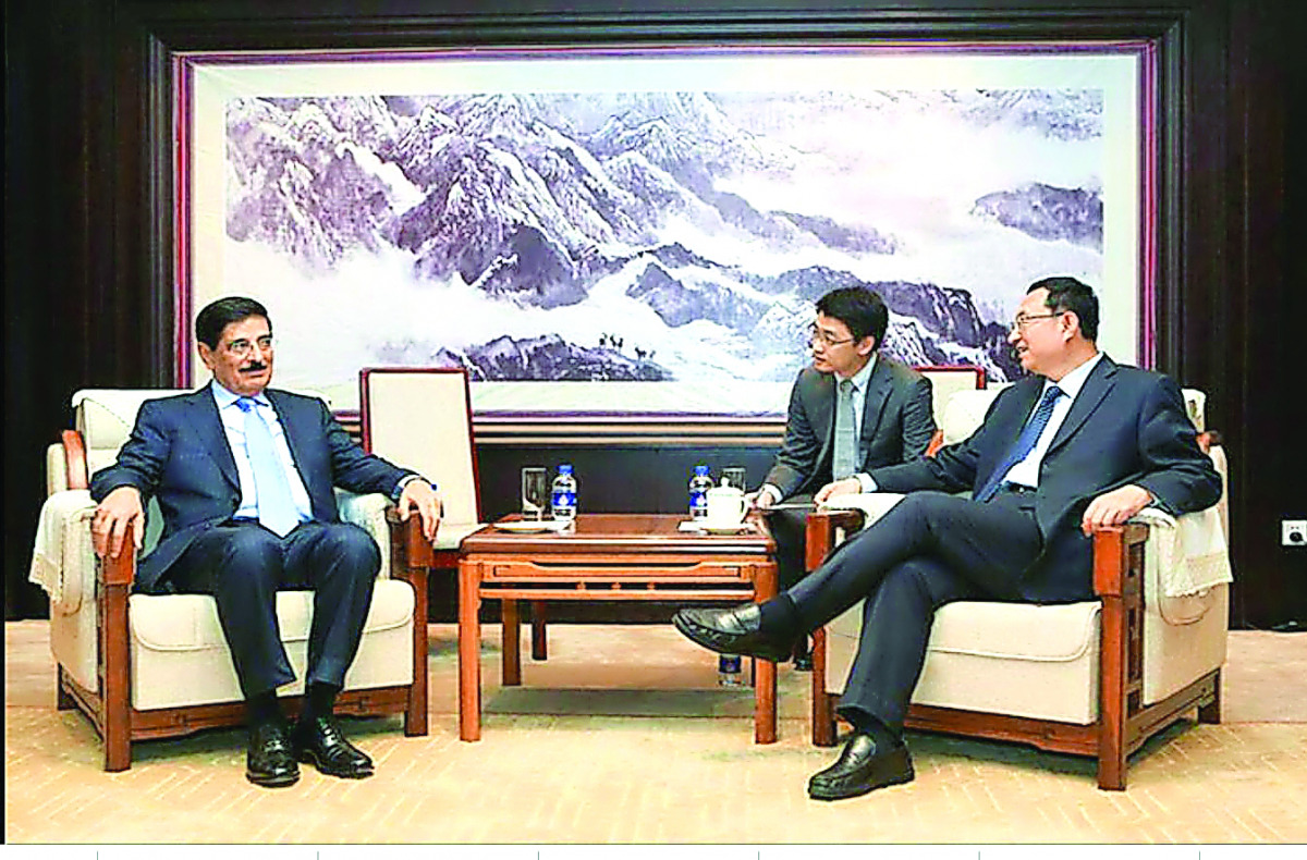 H E Dr Hamad bin Abdulaziz Al Kawari with China’s Minister of Culture Luo Shugang.