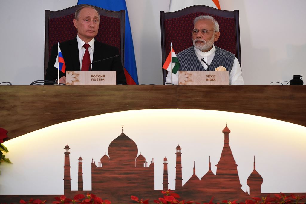 Russia's President Vladimir Putin (L) and Prime Minister Narendra Modi look on during the exchange of agreements and joint press statements ceremony during the Indo-Russia Annual Summit at Taj Exotica hotel in Goa on October 15, 2016. AFP / Prakash Singh 
