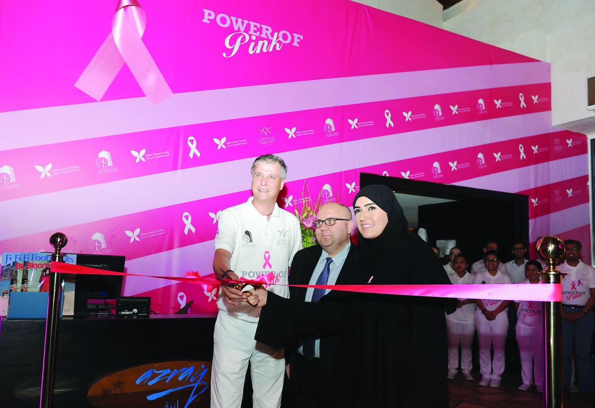 From Left: Thomas Fehlbier, General Manager, Banana Island Resort Doha, Dr Hadi Mohamed Abu Rasheed, Health Educator at the Qatar Cancer Society, and Asma Al Hamadi, media personality and Ambassador of Qatar Cancer Society, jointly inaugurating the Breast