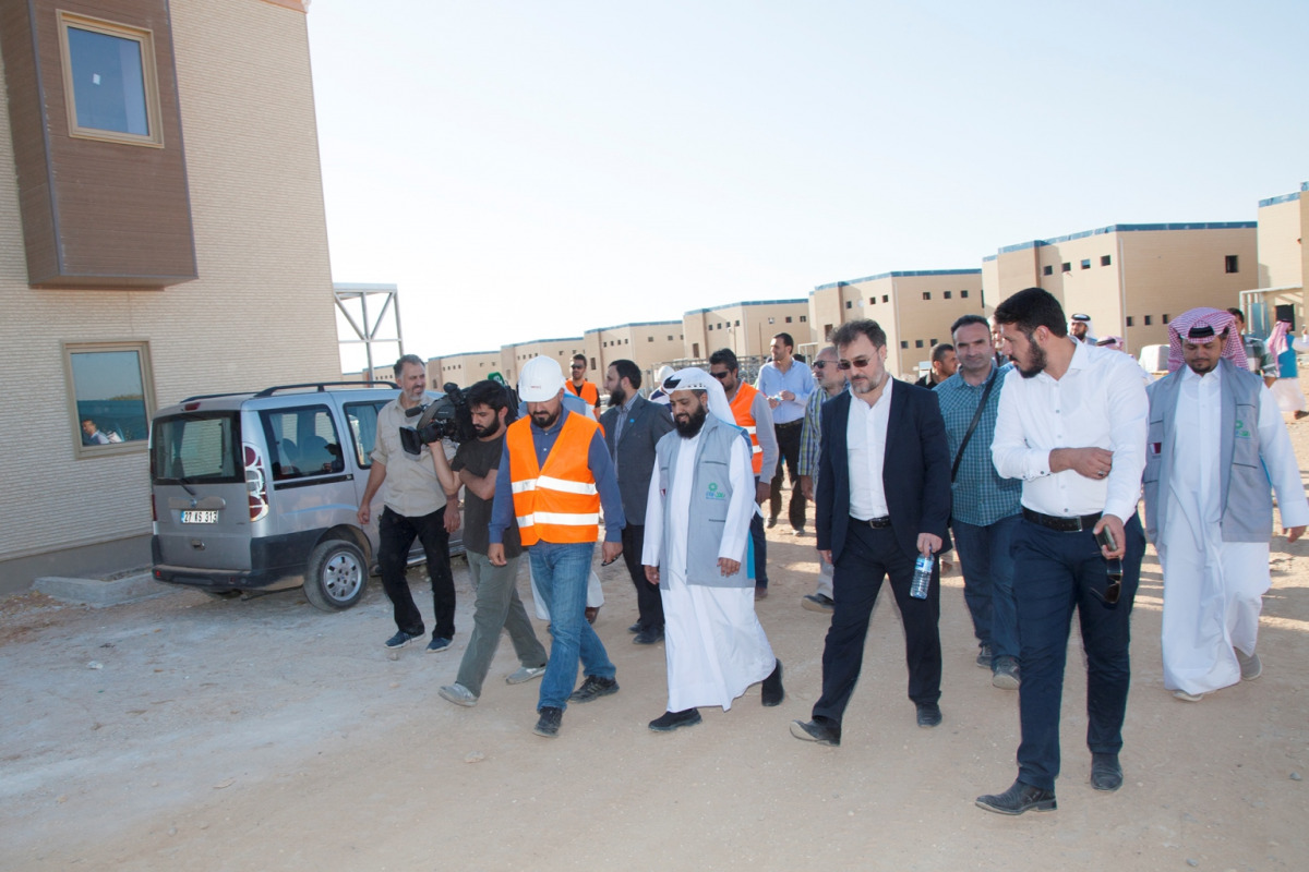 A delegation from RAF inside an orphan city developed by RAF in Al Rayhaniya city of Turkey.