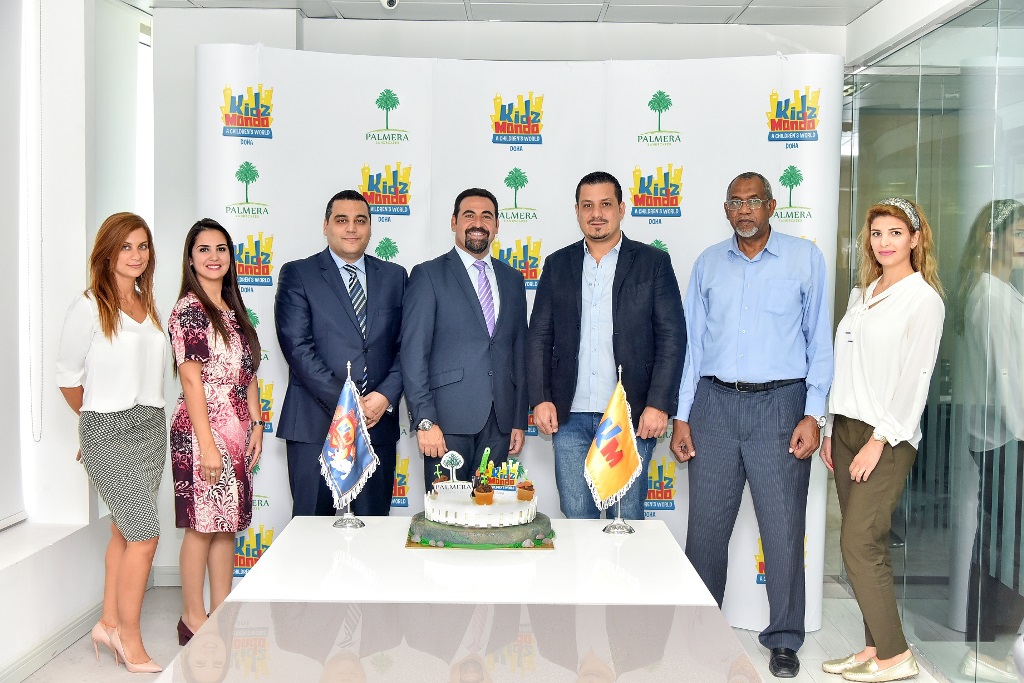 KidzMondo Doha and Palmera Landscapes officials after signing the agreement.