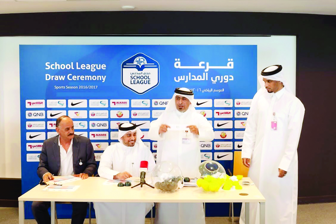 Officials of Qatar Football Association (QFA) conducting the draw ceremony of the School League in Doha yesterday. The school league is being held in collaboration with the Ministry of Education & Higher Education and Qatar School Sports Association (QSSA