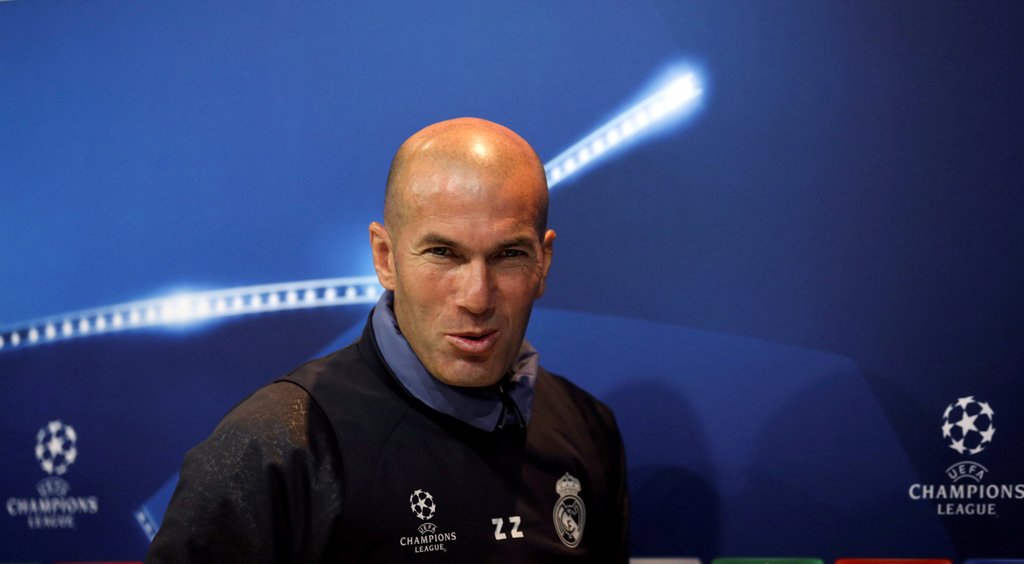 Real Madrid's coach Zinedine Zidane leaves news conference REUTERS/Sergio Perez
