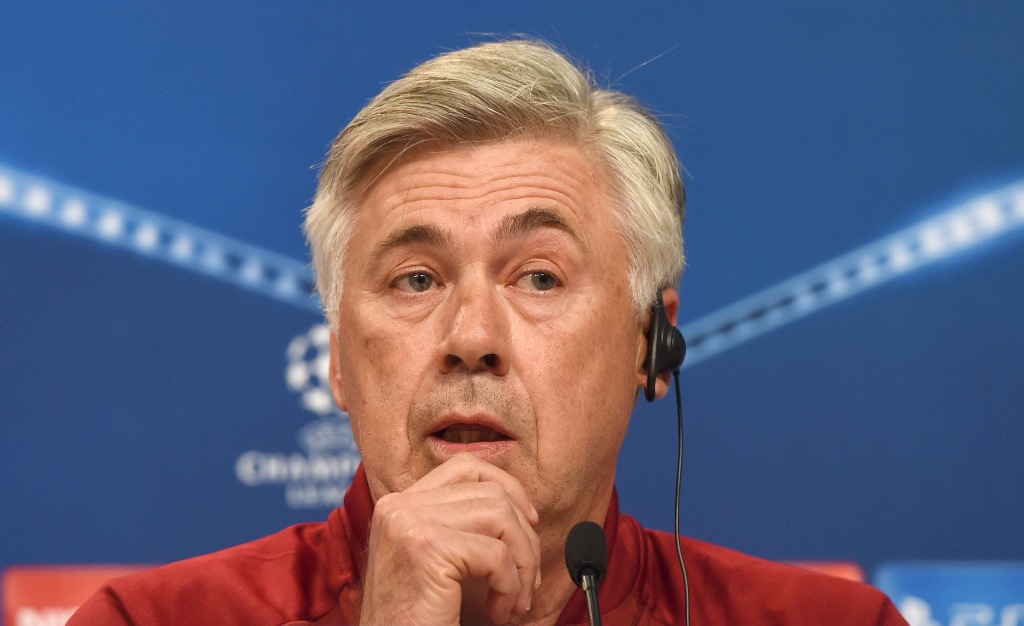 Bayern Munich's Italian headcoach Carlo Ancelotti follows a news conference, on the eve of the Champions League group D match between FC Bayern Munich and PSV Eindhoven at the stadium in Munich, southern Germany, on October 18, 2016. / AFP / CHRISTOF STAC