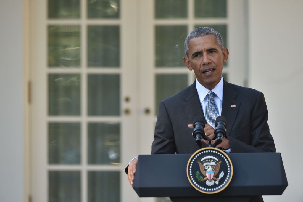 US President Barack Obama speaks during a joint press conference with Italian Prime Minister Matteo Renzi (not seen) in the Rose Garden at the White House in Washington, DC, October 18, 2016. / AFP / Nicholas Kamm
