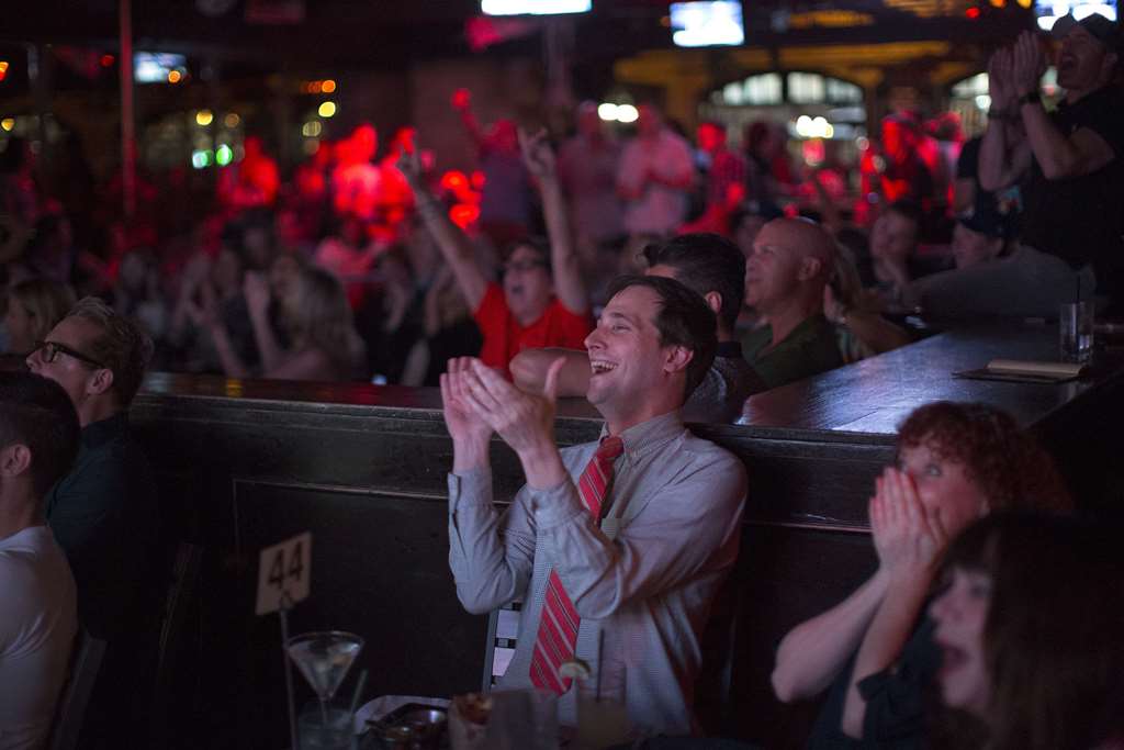 People react at The Abbey bar while watching the third and final presidential debate between Republican Donald Trump and Democrat Hillary Clinton on October 19, 2016 in West Hollywood, California. David McNew/Getty Images/AFP