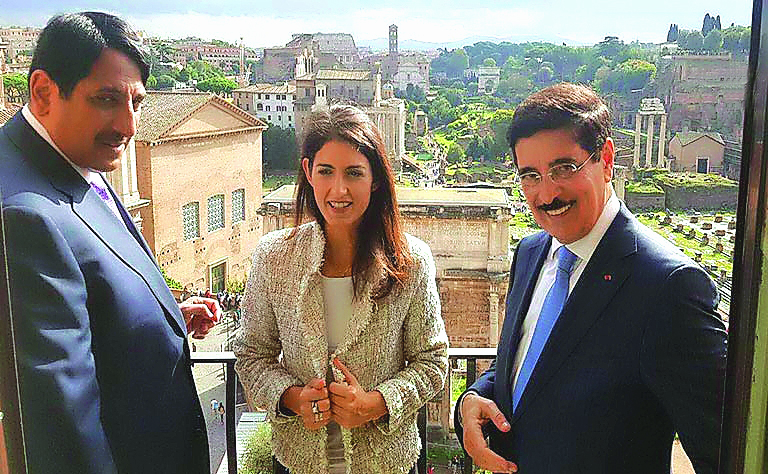 H E Dr Hamad bin Abdulaziz Al Kawari (right), Cultural Adviser at the Emiri Diwan and Qatar’s candidate for the post of Director-General at Unesco, with Mayor of Rome Virginia Raggi (centre). Qatar’s Ambassador to Italy Abdulaziz bin Ahmed Al Malki is als