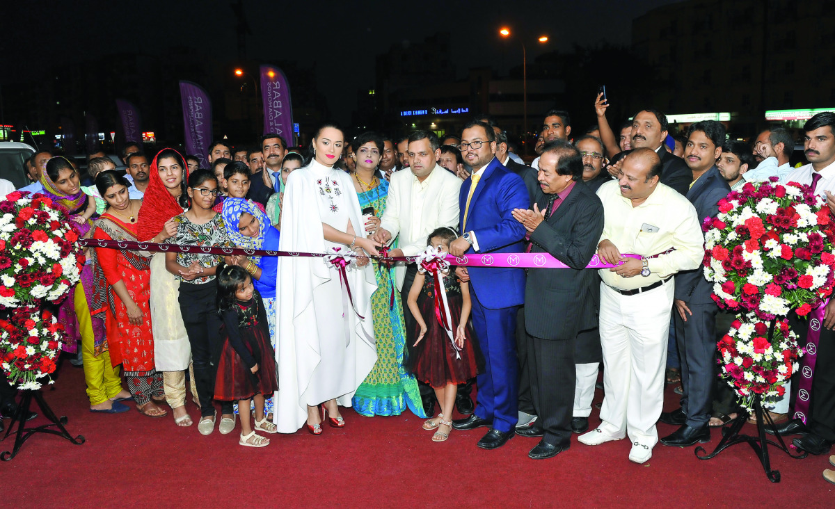 Arab female sporting icon Nada Zeidan cutting a ceremonial ribbon to mark the opening of the Malabar Gold and Diamonds’ renovated showroom at Al Watan Center along with R K Singh, Deputy Chief of Mission at Indian Embassy, Shamlal Ahamed M P, Managing Dir