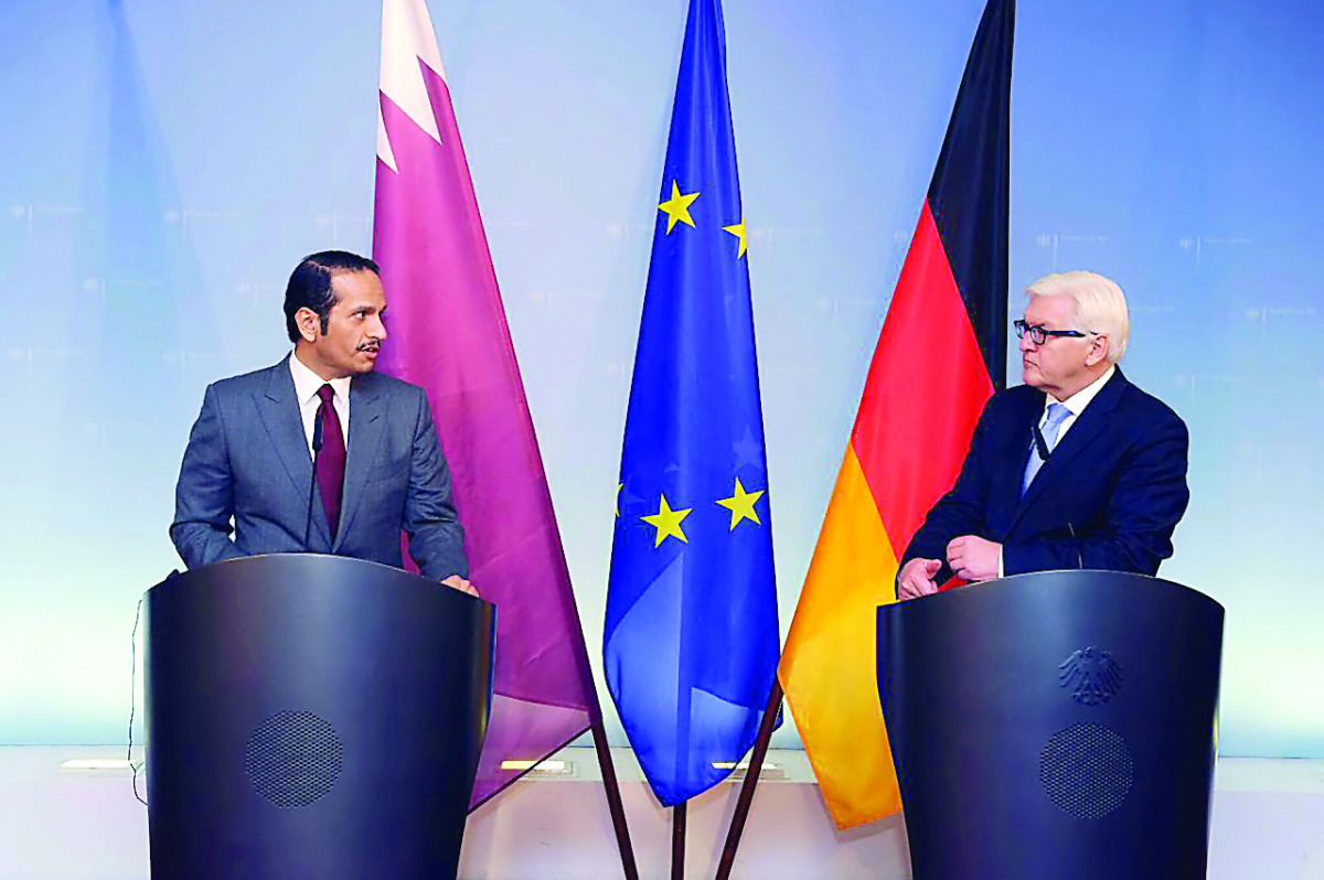 Foreign Minister H E Sheikh Mohammed bin Abdulrahman Al Thani with  his German counterpart Frank-Walter Steinmeier at a joint press meet in Berlin, yesterday.