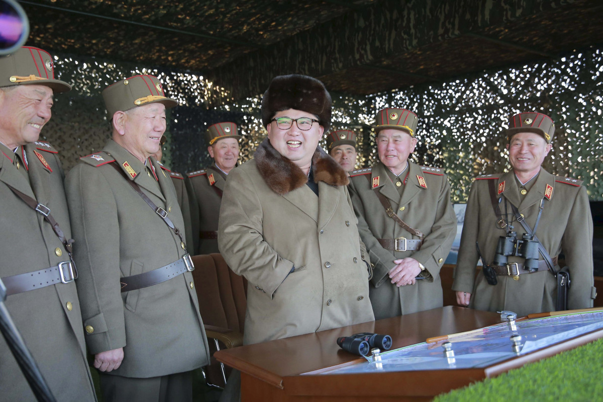 North Korean leader Kim Jong Un with military officers as he observes a drill (Korean Central News Agency / REUTERS) 