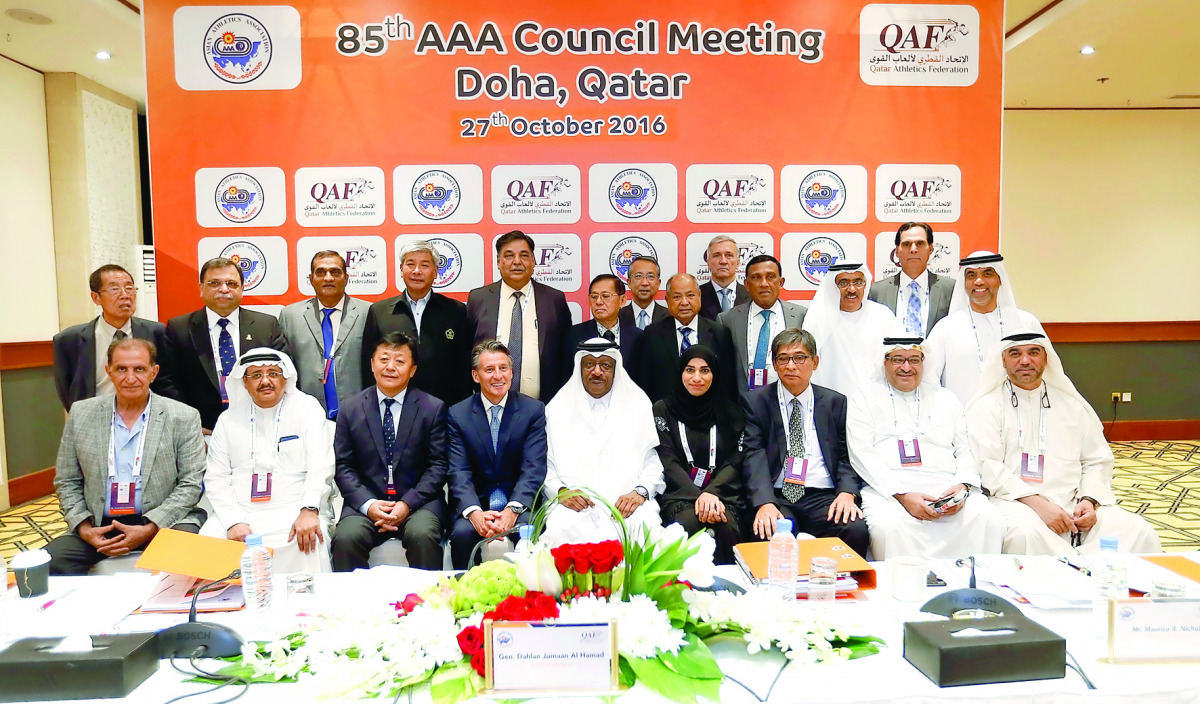 Officials of IAAF and Asian Athletics Association pose for a photograph with representatives of athletics associations from participating countries. 