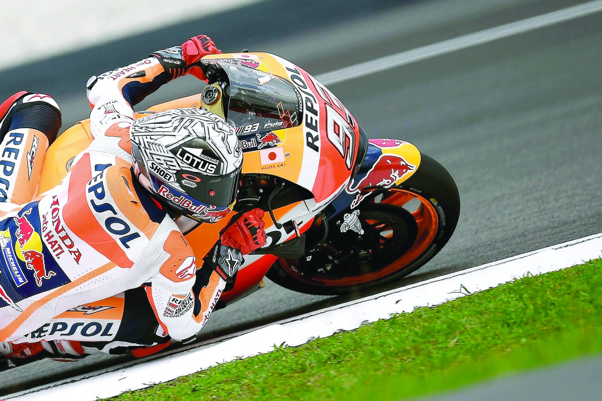 Repsol Honda Team’s Spanish rider Marc Marquez in action during the first practice session of the 2016 Malaysian MotoGP at the Sepang International Circuit yesterday.