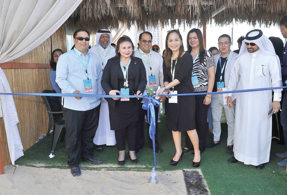 Charito B Plaza (second left), Director General of Philippine Economic Zone Authority, and Sharon S Garin (third left), Deputy Speaker of the Philippine House of Representatives, jointly cut the ribbon to mark the opening of the Philippine Property and In