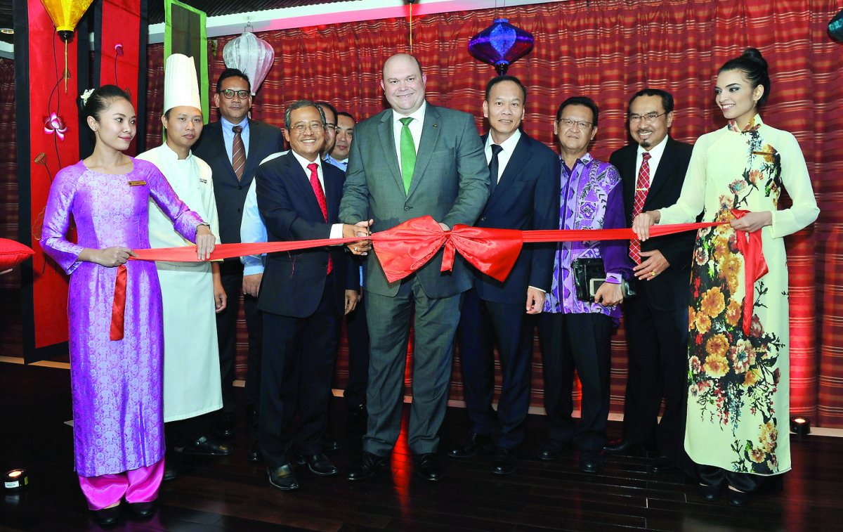 Vietnamese Ambassador Nguyen Hoang (fourth left) and Shangri-La Hotel Doha General Manager Alex Willats (centre) with diplomats from several countries at the opening of the Vietnamese Culture and Cuisine Festival in Doha yesterday. Pic: Kammutty VP / The 