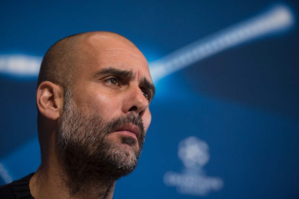 Manchester City's Spanish manager Pep Guardiola addresses the media during a press conference at the City Football Academy in Manchester, northern England, on October 31, 2016, ahead of their UEFA Champions League group C football match against Barcelona 