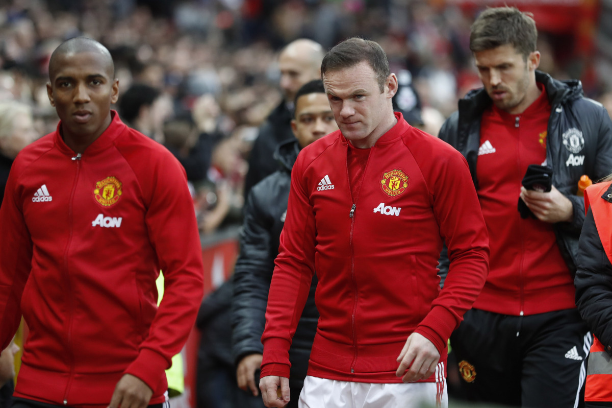 (L - R) Manchester United's Ashley Young, Wayne Rooney and Michael Carrick (Reuters / Carl Recine)