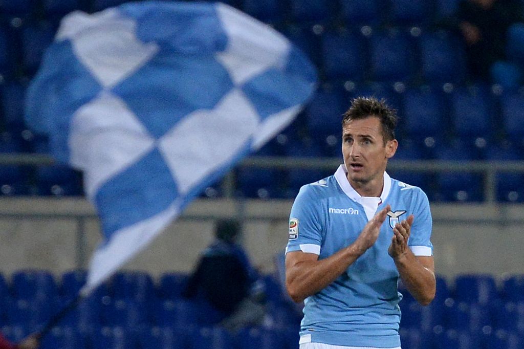 (FILES) This file photo taken on November 3, 2014 shows Lazio's forward from Germany Miroslav Klose celebrating after scoring during the Italian Serie A football match Lazio vs Cagliari at the Olympic Stadium in Rome. Germany's Miroslav Klose, the top sco