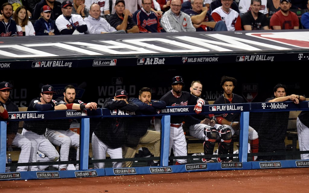  Cleveland Indians players react in the dugout in the 8th inning against the Chicago Cubs in game six of the 2016 World Series at Progressive Field. David Richard-USA TODAY Sports