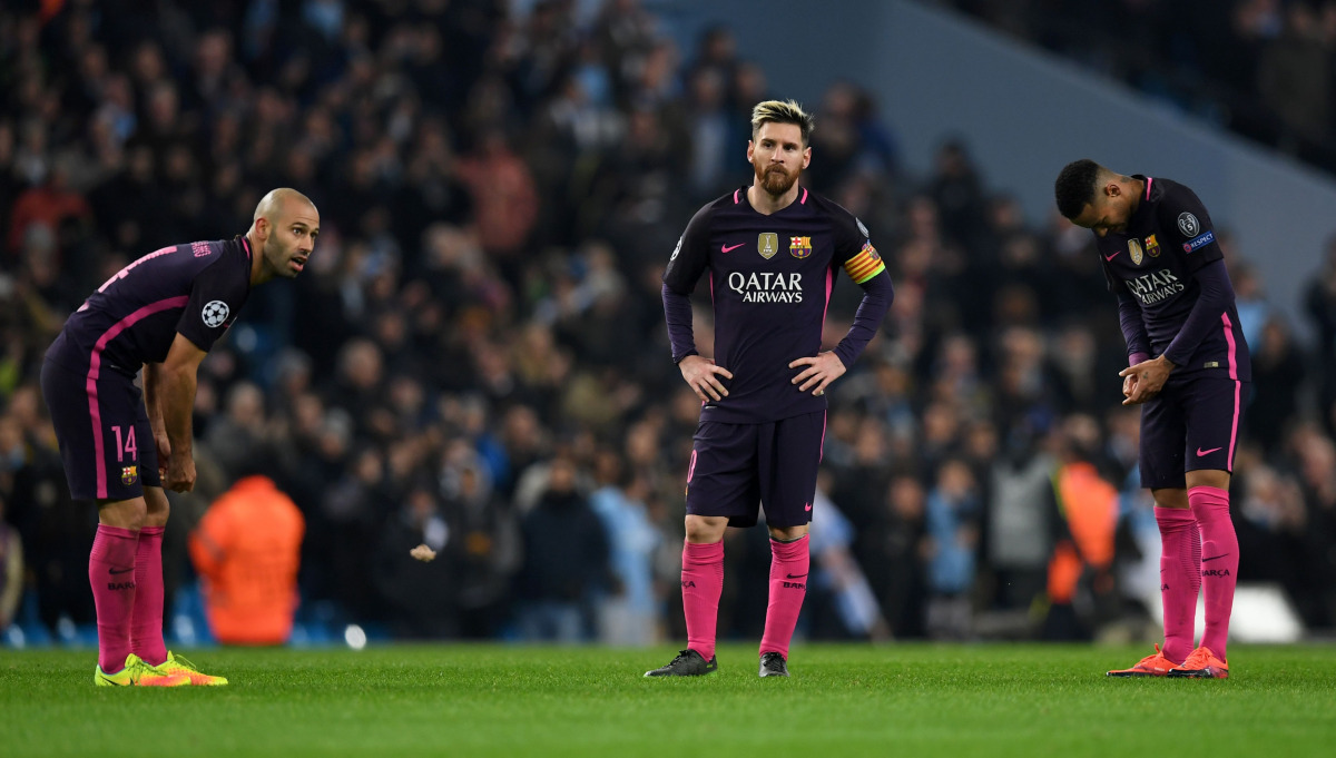 Barcelona's defender Javier Mascherano, strikers Lionel Messi and Neymar react following the UEFA Champions League group C football match between Manchester City and Barcelona at the Etihad Stadium in Manchester, north west England on November 1, 2016. (A