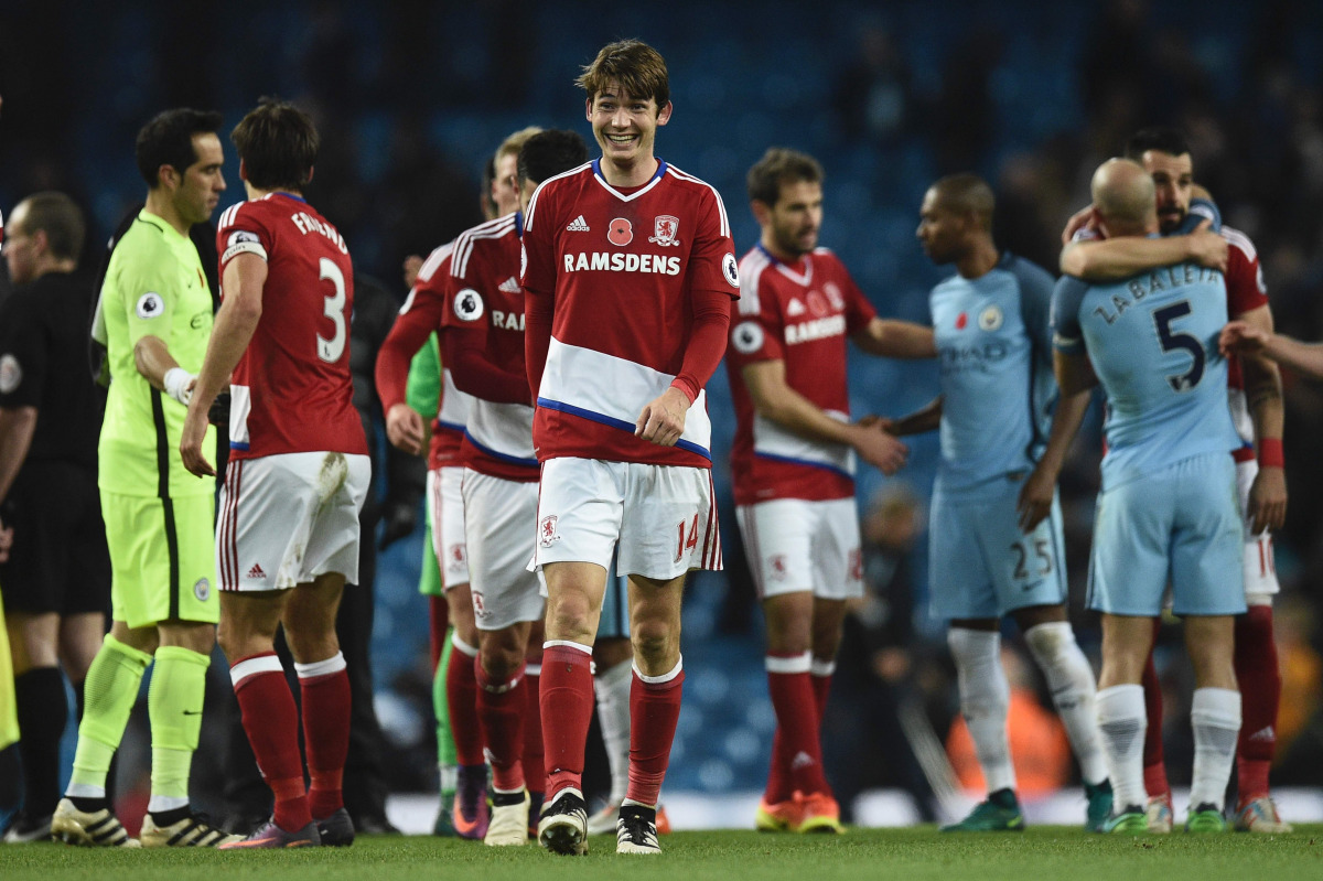 Middlesbrough's Dutch midfielder Marten de Roon (C) smiles at the end of the English Premier League football match between Manchester City and Middlesbrough at the Etihad Stadium in Manchester, north west England, on November 5, 2016. (AFP / Oli Scarff)