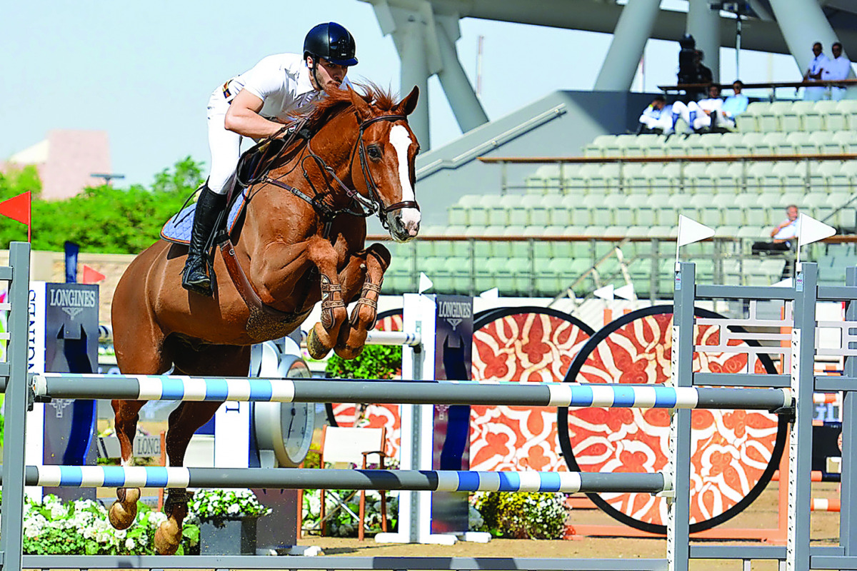 British Olympic Gold Medallist John Whitaker astride Argento, clears a hurdle during the CSI5* 1.50/1.55m event of Longines Global Champions Tour at Al Shaqab Arena yesterday. LGCT/Stefano Grasso 
